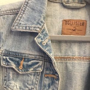 Hollister distressed crop denim jacket.